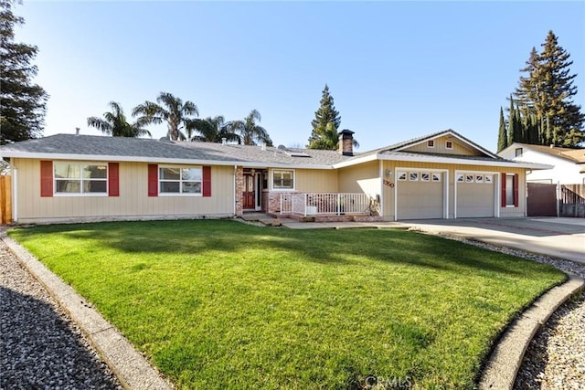 ranch-style house with driveway, a chimney, an attached garage, fence, and a front yard