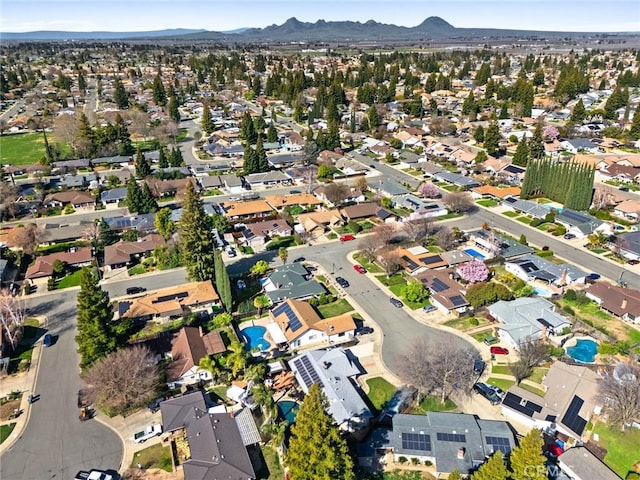 birds eye view of property featuring a residential view and a mountain view