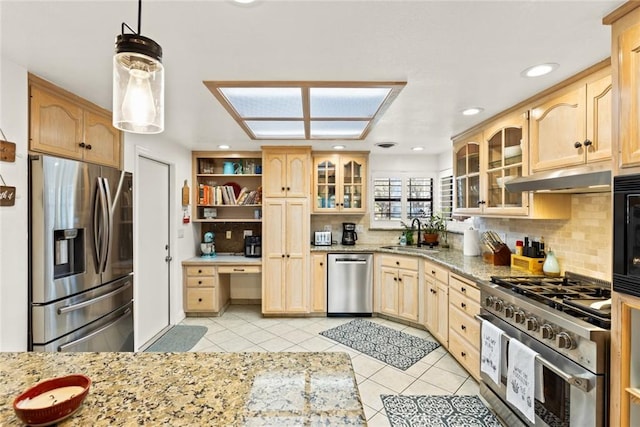 kitchen featuring stainless steel appliances, under cabinet range hood, open shelves, a sink, and light tile patterned flooring