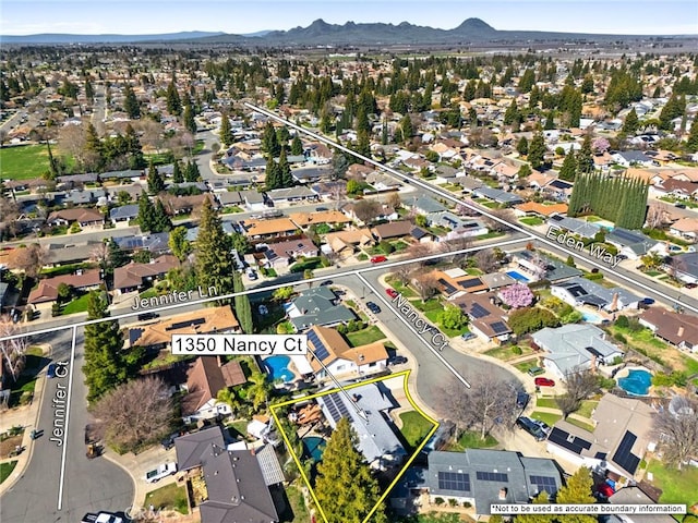 aerial view with a residential view and a mountain view