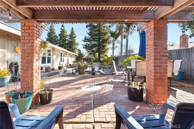 view of patio with outdoor dining area, a fenced backyard, and a pergola