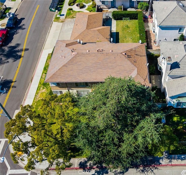 birds eye view of property with a residential view