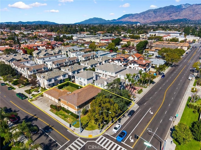 bird's eye view with a residential view and a mountain view