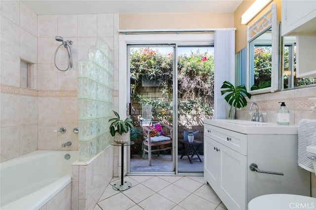 full bathroom featuring a healthy amount of sunlight, tile patterned flooring, and vanity