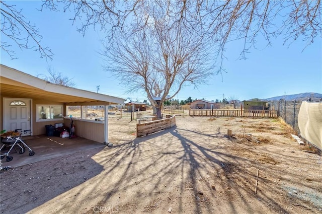 view of yard with a fenced backyard and a patio