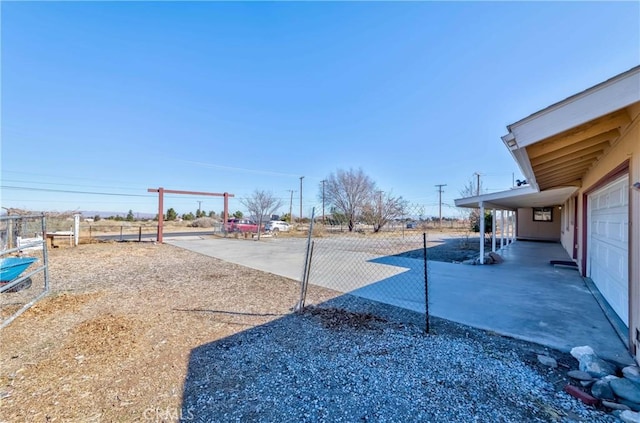 view of yard featuring a patio area and fence