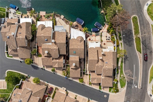 aerial view with a residential view and a water view