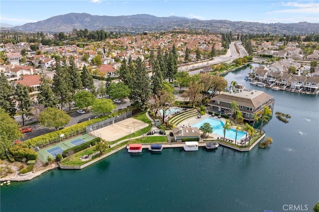 bird's eye view with a residential view and a water and mountain view