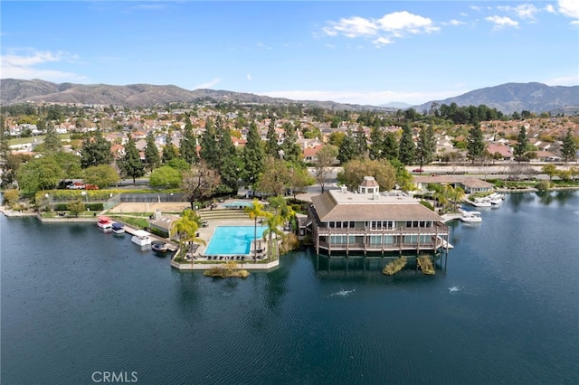 bird's eye view featuring a water and mountain view