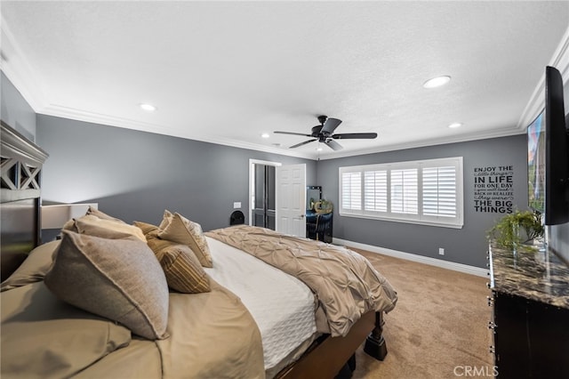 bedroom featuring carpet floors, crown molding, and baseboards