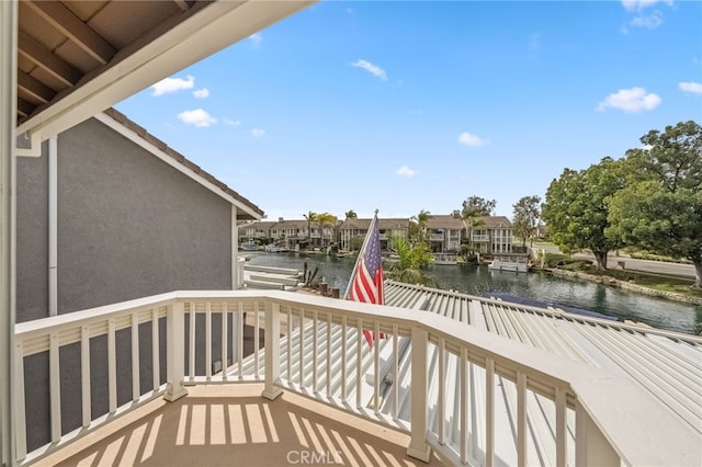 balcony featuring a water view