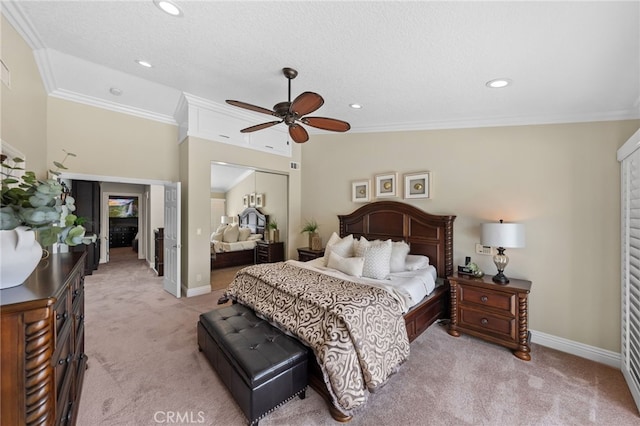 bedroom with a closet, light carpet, crown molding, and baseboards