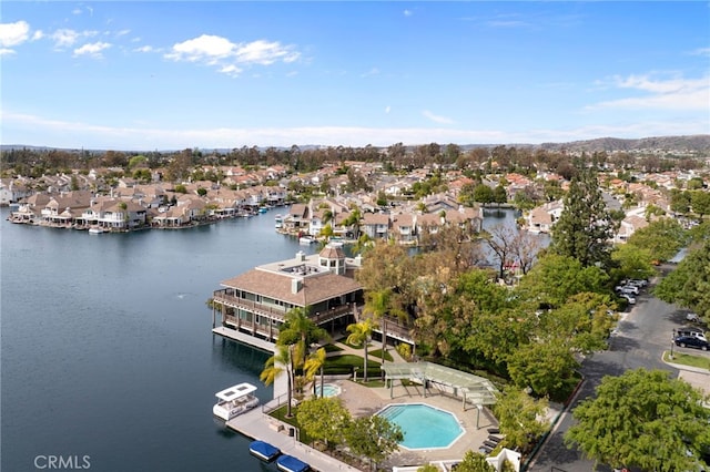 aerial view featuring a water view and a residential view