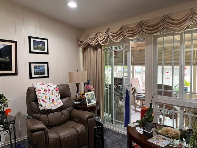 living room featuring a decorative wall