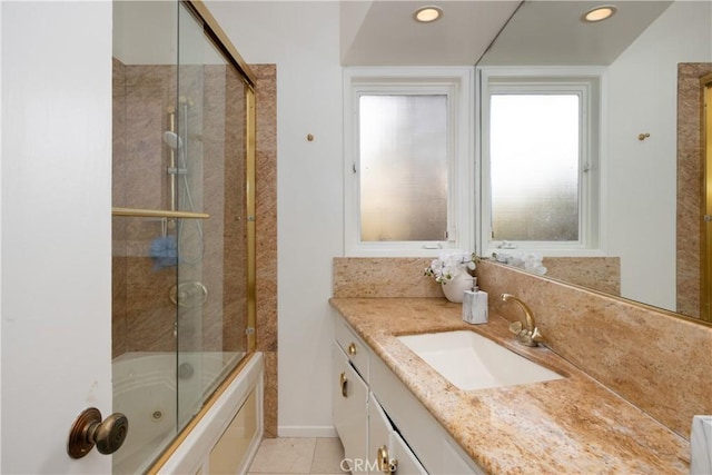 full bathroom featuring recessed lighting, tile patterned flooring, shower / bath combination with glass door, and vanity