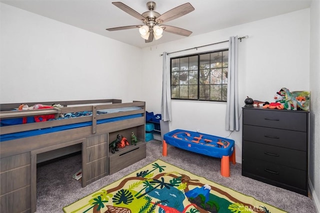 bedroom featuring ceiling fan and carpet flooring