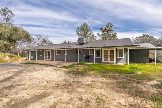 back of house featuring central AC, french doors, and a patio area