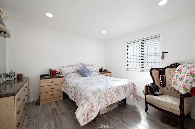 27447 Cypress St, Highland, CA 92346 - bedroom with wood finished floors, recessed lighting, and baseboards