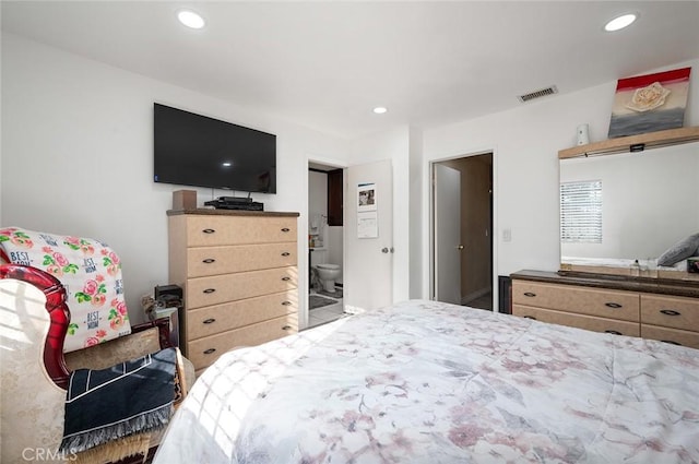 bedroom featuring visible vents and recessed lighting