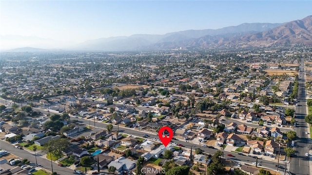 birds eye view of property featuring a residential view and a mountain view