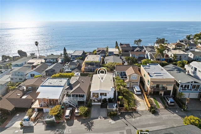 aerial view featuring a residential view and a water view