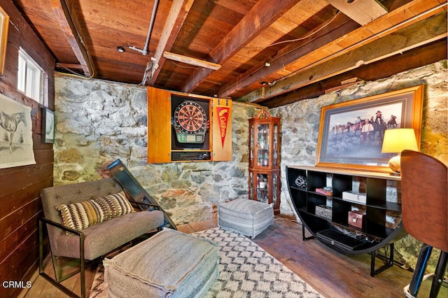 living area with wooden ceiling and wood finished floors