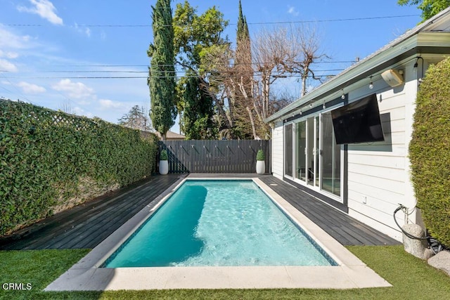 view of pool with a fenced backyard and a fenced in pool