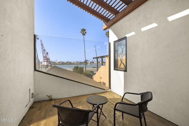 view of patio / terrace featuring a balcony and a pergola