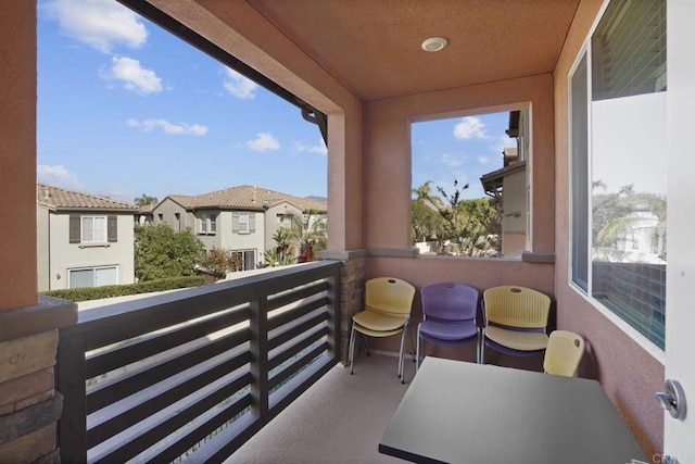 balcony featuring a residential view