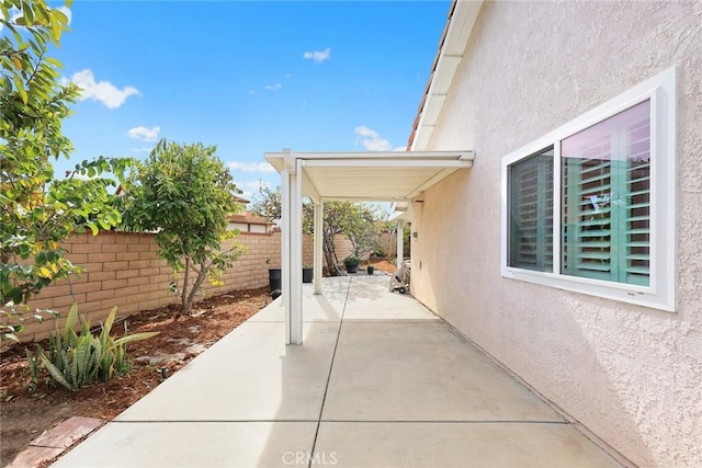 view of patio with fence