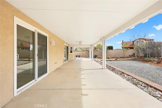 view of patio / terrace featuring a fenced backyard and a ceiling fan