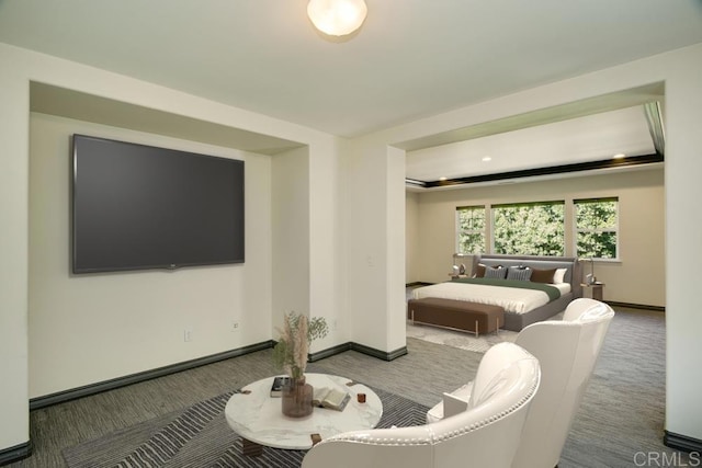 bedroom featuring baseboards and carpet floors