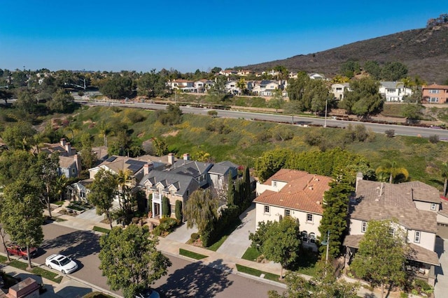 bird's eye view with a mountain view and a residential view