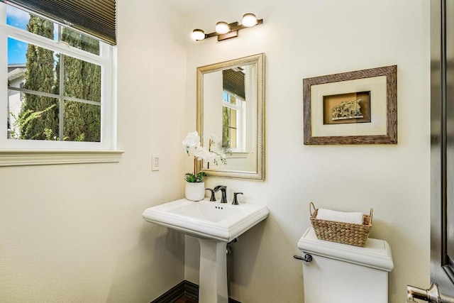 3518 Camino Cereza, Carlsbad, CA 92009 - half bathroom featuring plenty of natural light and toilet