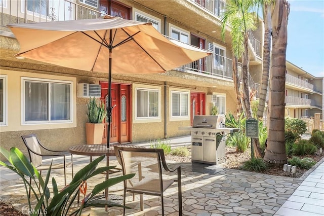 view of patio with a grill