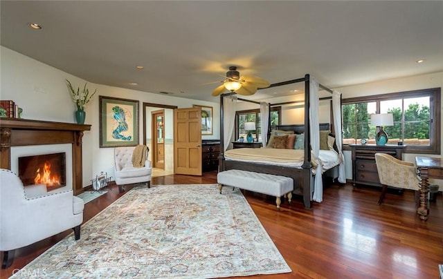 420 Inverness Dr, La Canada Flintridge, CA 91011 - bedroom featuring dark wood finished floors, recessed lighting, and a warm lit fireplace