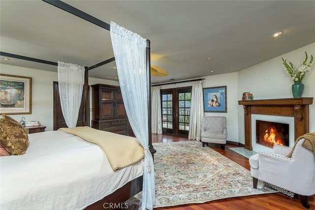 420 Inverness Dr, La Canada Flintridge, CA 91011 - bedroom with wood finished floors, baseboards, recessed lighting, french doors, and a fireplace with flush hearth