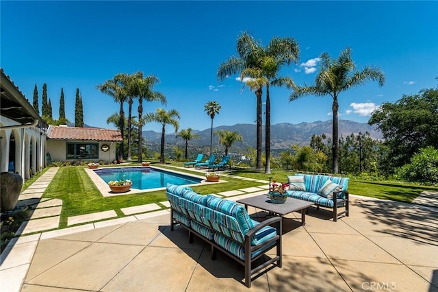 420 Inverness Dr, La Canada Flintridge, CA 91011 - outdoor pool with an outdoor hangout area, a yard, a patio, and a mountain view