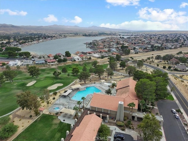 bird's eye view with a water and mountain view