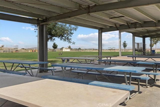 view of home's community featuring a lawn