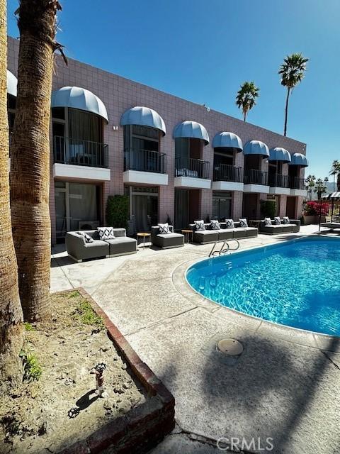 community pool with a patio