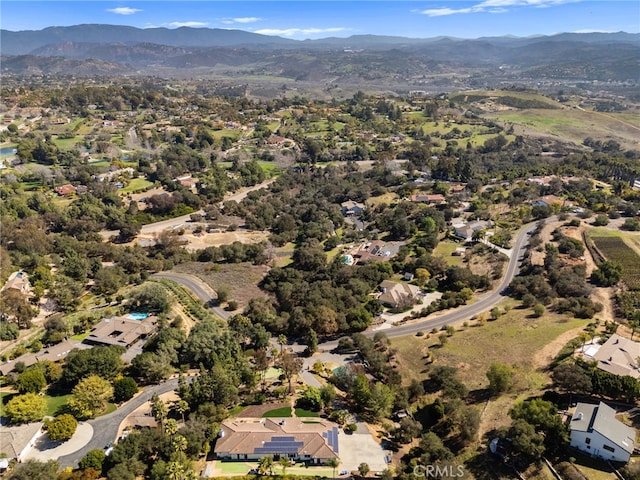 drone / aerial view featuring a mountain view