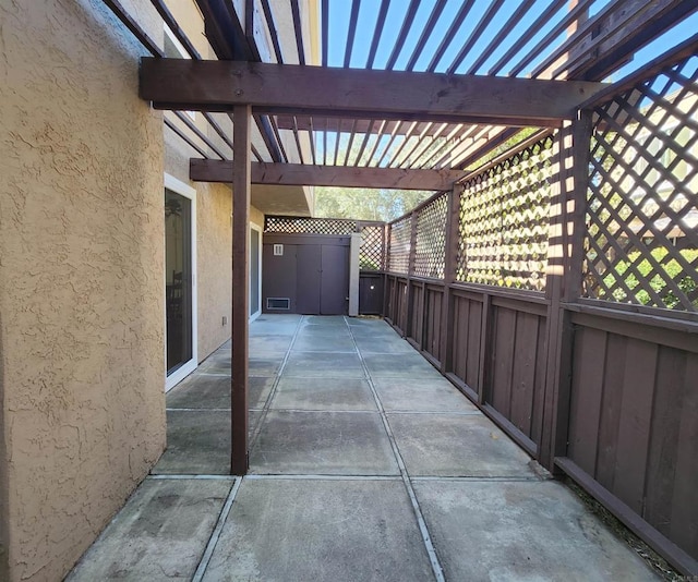 view of patio featuring a pergola