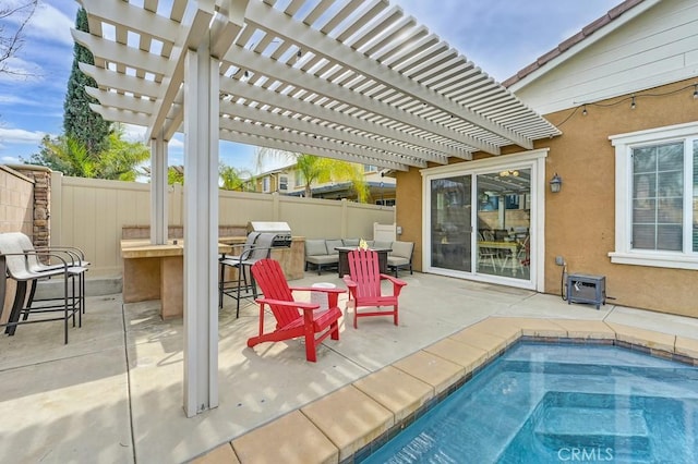 view of patio / terrace featuring area for grilling and fence