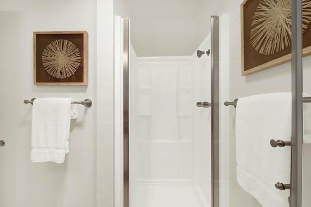 bathroom featuring a stall shower