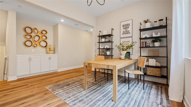 home office with light wood-style flooring, baseboards, and recessed lighting