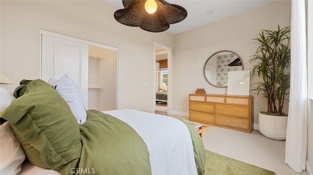 carpeted bedroom with a ceiling fan