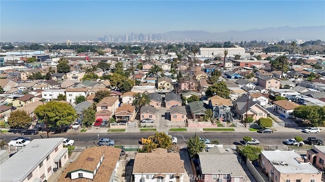 birds eye view of property with a residential view