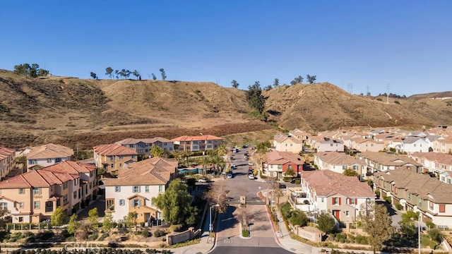 bird's eye view with a residential view and a mountain view