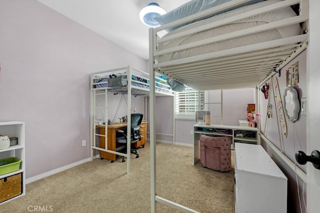 bedroom with carpet and baseboards